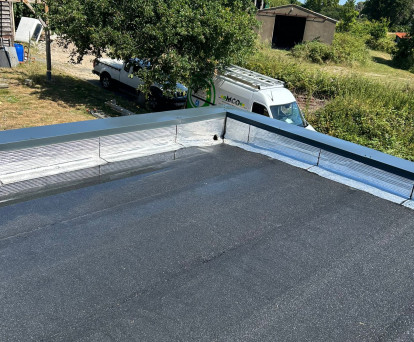 Pose d'un complexe d'étanchéité sur 35 m²